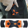 A black and orange razor blade scraper tool is shown with a gloved hand, next to its disassembled components.
