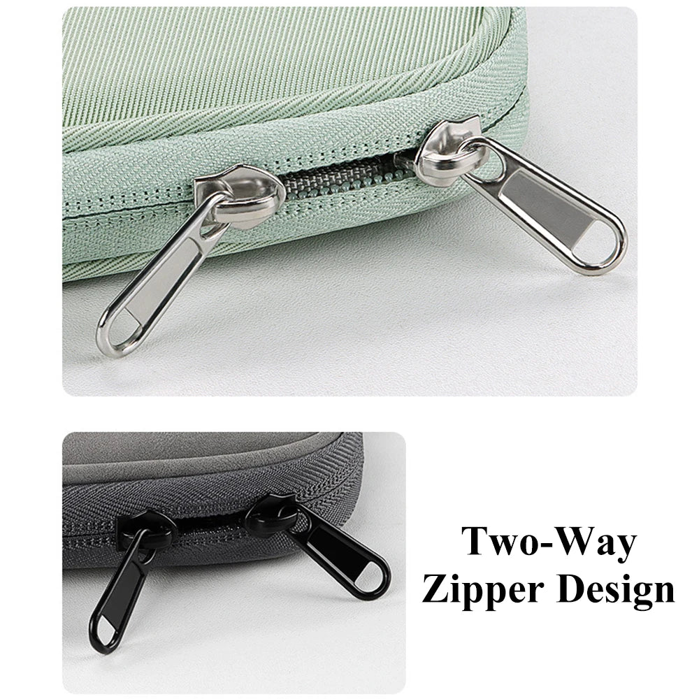 Close-up of a light green padded laptop sleeve bag featuring a two-way zipper design and silver hardware.