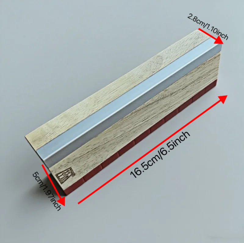 A wooden fingerboard ramp set featuring a quarter pipe and rail, shown in profile view.