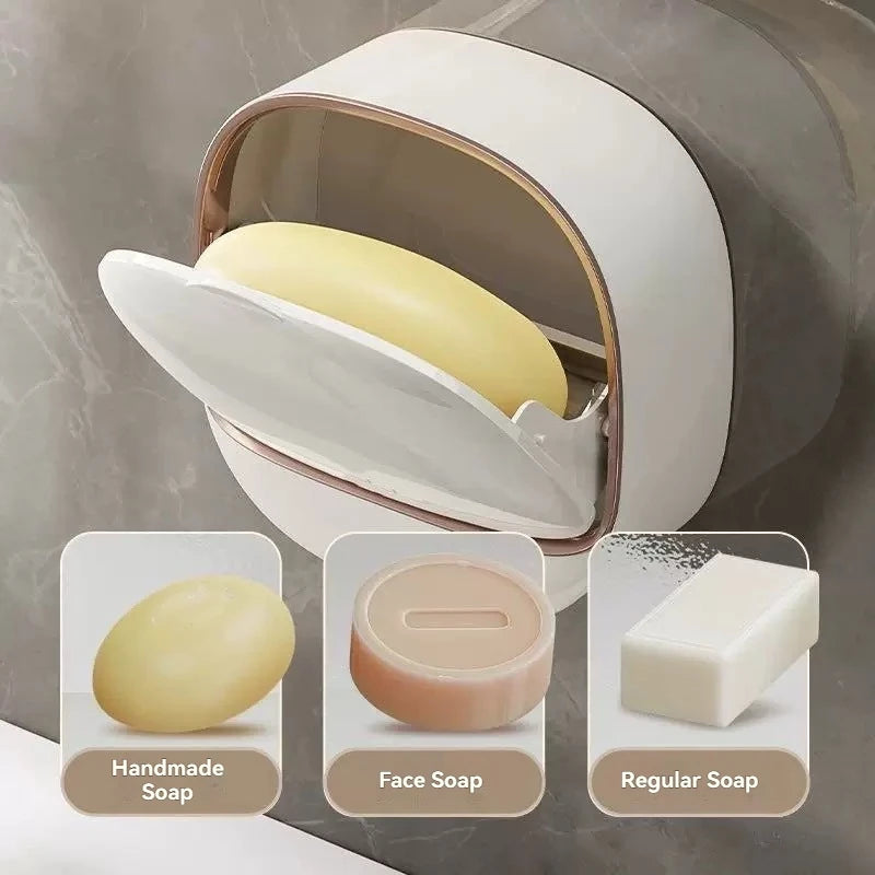 A white hanging soap holder with a drainage feature displaying handmade, face, and regular soaps.