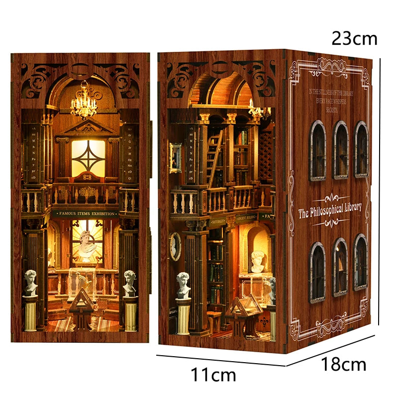 A wooden book nook kit featuring an elaborate library scene with detailed architecture and internal LED lighting.
