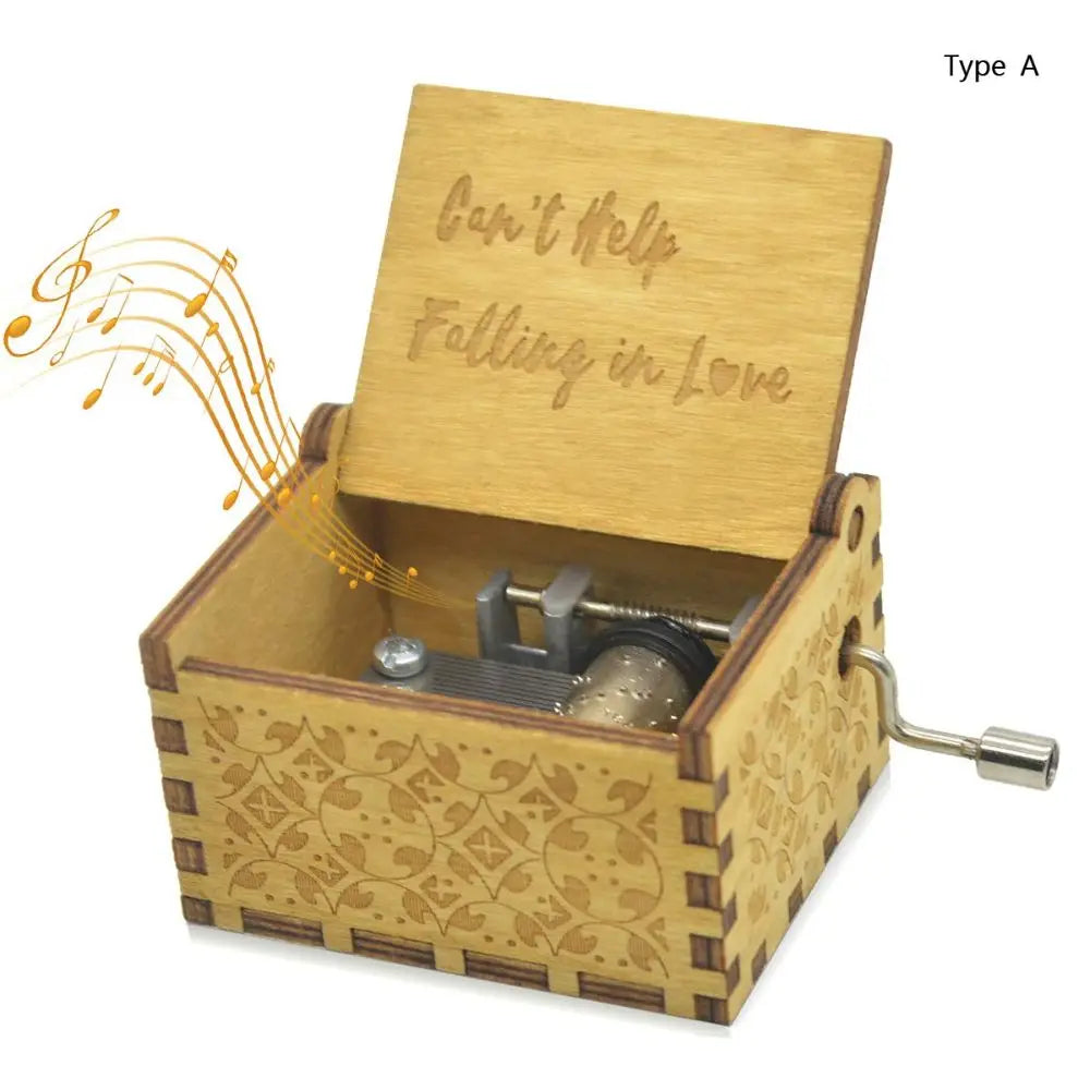 A vintage hand-cranked wooden music box plays the song Can't Help Falling in Love.
