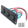 Black joystick switch panel with three green toggle switches and red and blue wires