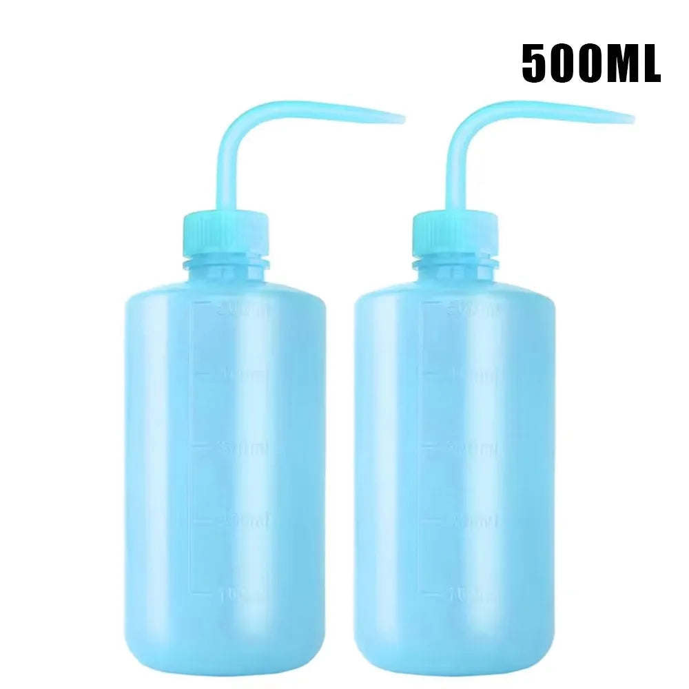 Two 500ml light blue tattoo squeeze bottles with precision tips