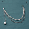 Silver multi-layer chain strap necklace with diamond accents and a pearl pendant