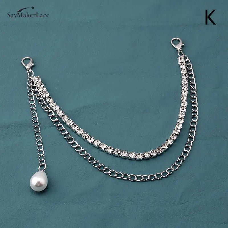 Silver multi-layer chain strap necklace with diamond accents and a pearl pendant