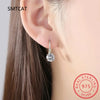 Boucles d'oreilles pendantes en Moissanite plaqué Or 14K