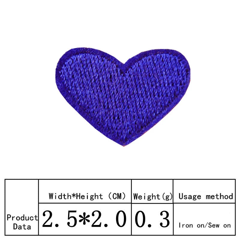A vibrant royal blue heart shaped iron-on patch for clothing and crafts.