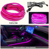 Purple pink flexible USB LED neon strip ambient lighting installed in a car interior dashboard.