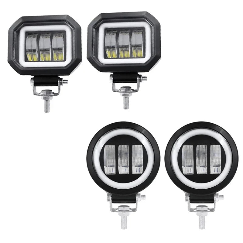 Zwei schwarze LED-Arbeitsleuchtenhalterungen für die Fahrzeugmontage.