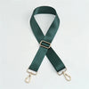 A dark green nylon bag strap with a gold buckle and metal clasps.
