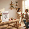 A couple is looking at a personalized love book with a fill-in-the-blank design on a wooden table.