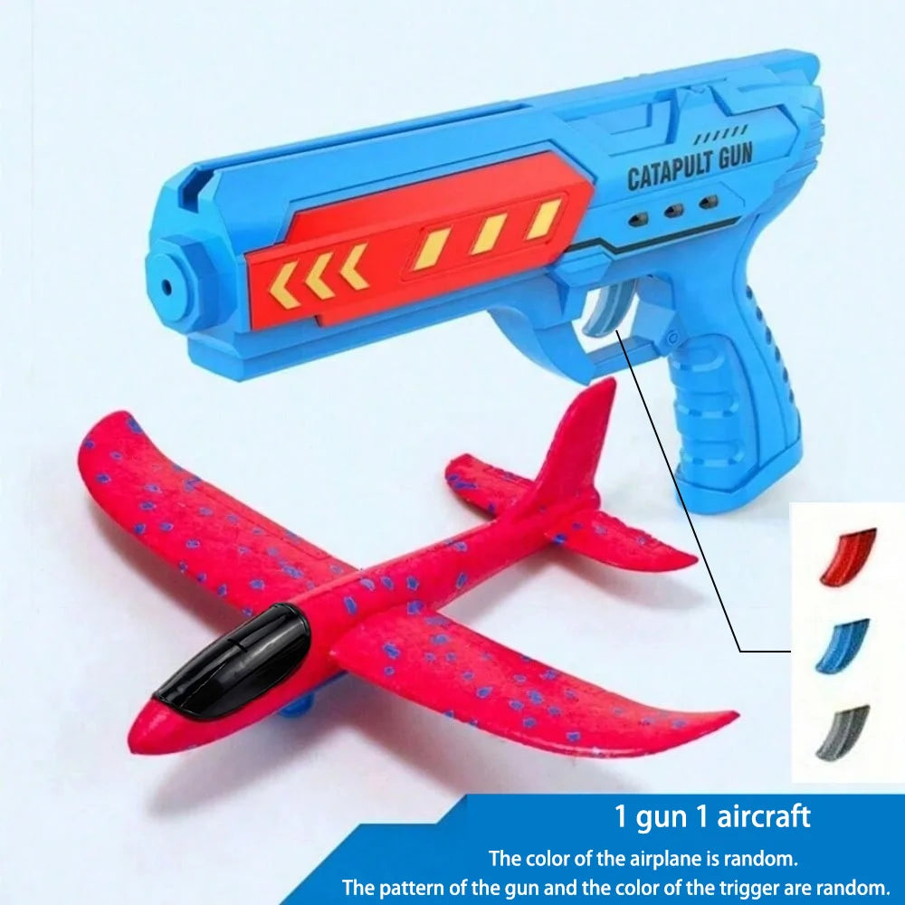 A blue catapult gun and a red foam airplane are shown together.