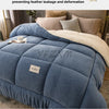 A blue velvet quilt blanket with a fixed-point quilting process shown next to its components.