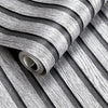 Roll of wood grain self-adhesive wallpaper showing vertical stripes in gray and white.