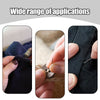 A close-up of a hand using a self-threading sewing needle to thread fabric, demonstrating the application of the set.