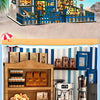 A wooden dollhouse miniature assembly kit featuring a detailed cafe facade and interior elements.