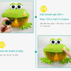 A green frog-shaped bath toy is shown with instructions for adding shower gel and water to play.