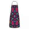 A dark blue apron with a vibrant floral pattern featuring pink, orange, and green flowers.