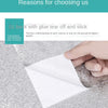A hand is applying a white, self-adhesive sticker to a textured surface, demonstrating its ease of use.