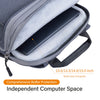 A gray laptop backpack showing an independent padded space for a black laptop.