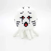 A white soft plush doll resembling a Minecraft character face with black markings and white appendages.