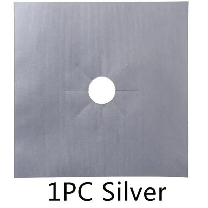 One piece silver stove burner mat with a central hole and radiating arms.