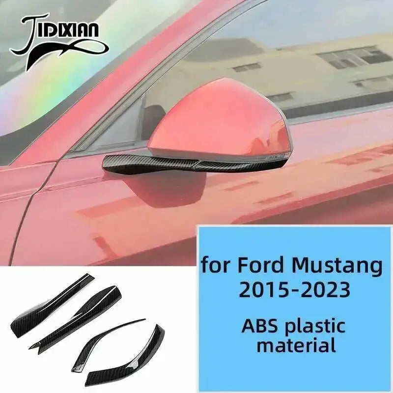 Close-up of a red Ford Mustang car with a black carbon fiber grain decorative trim piece on the fender.