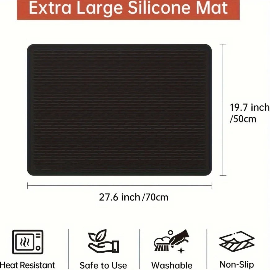 Schwarze Silikonmatte zum Schutz von Herdplatten und rutschfeste Oberfläche.