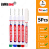 Five long marker tools with different colored tips for woodworking and construction