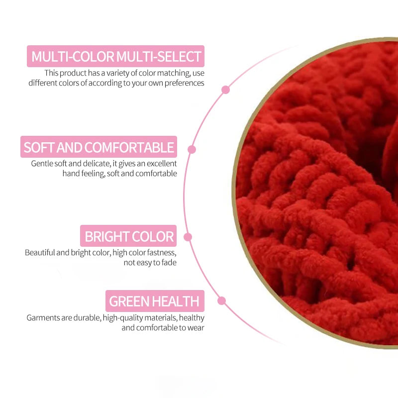 Close-up view of bright red chunky chenille yarn showing its soft texture and fibers.