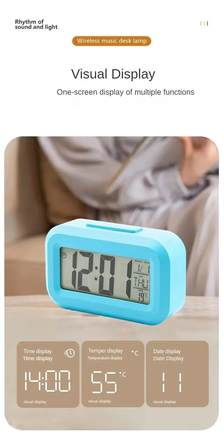 A light blue digital display showing time, temperature, and date functions on a compact LED desk lamp.