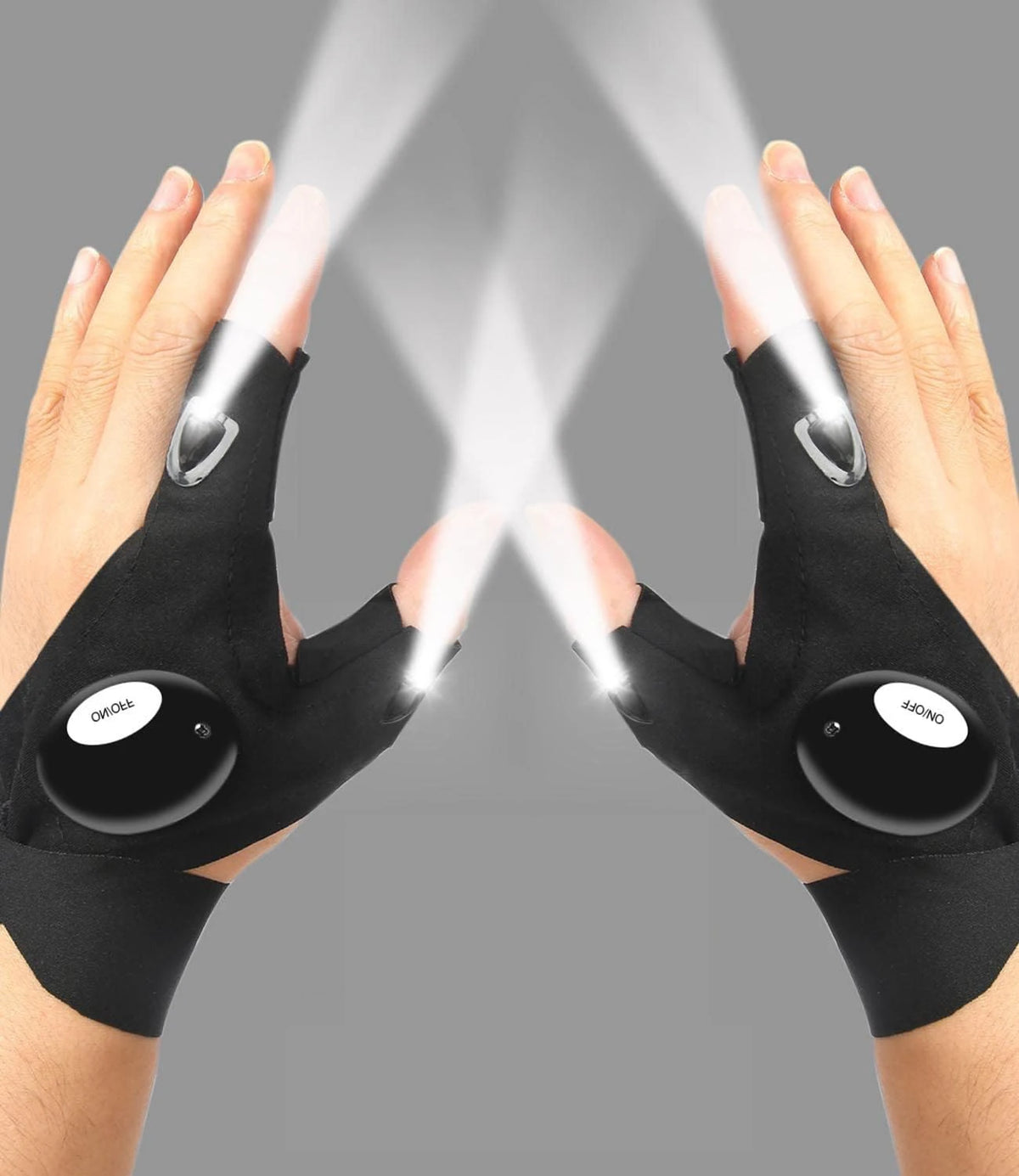 Pair of black waterproof LED half-finger gloves being used to illuminate a surface.