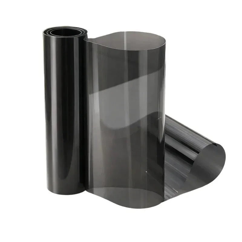 Roll of smoke black headlight and taillight tint film rolled up