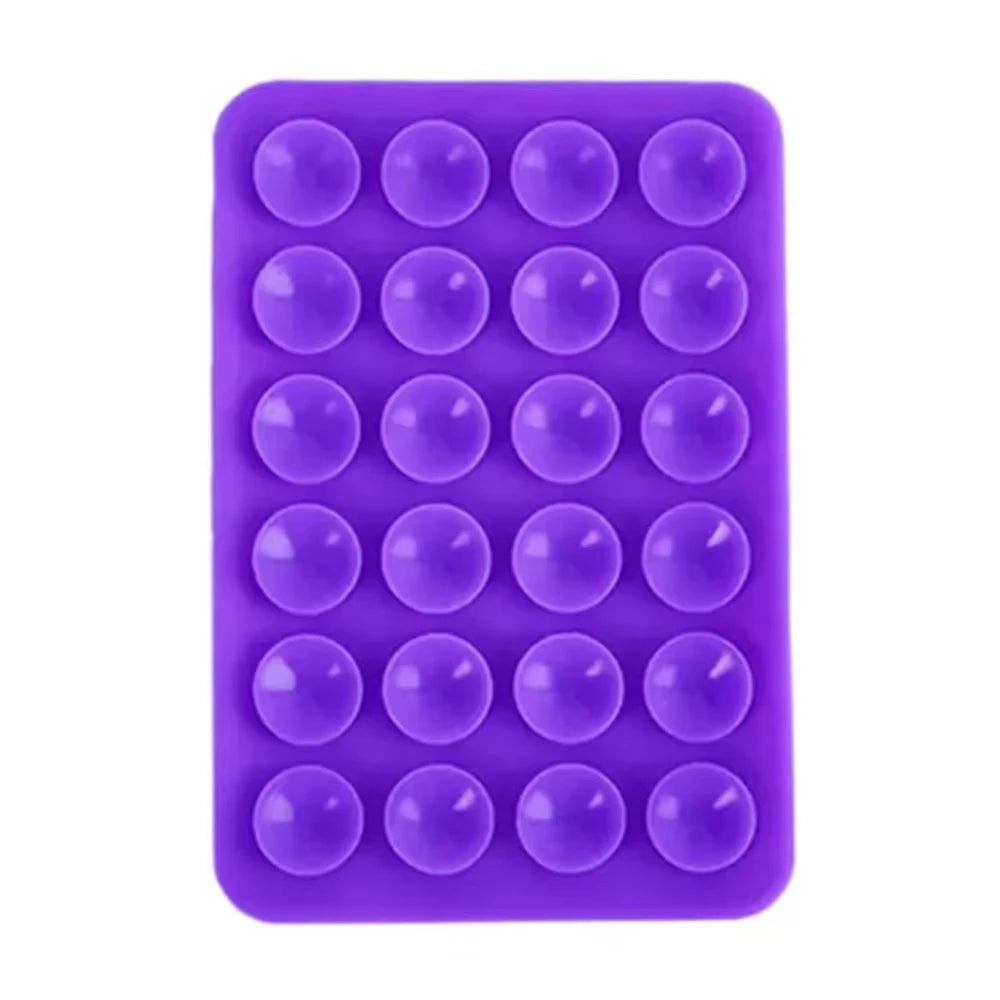 A purple reusable silicone suction cup phone mount for hands-free viewing.