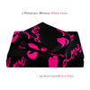 A set of 2 pillowcases and 1 duvet cover featuring a playful pink lips print on a black background.