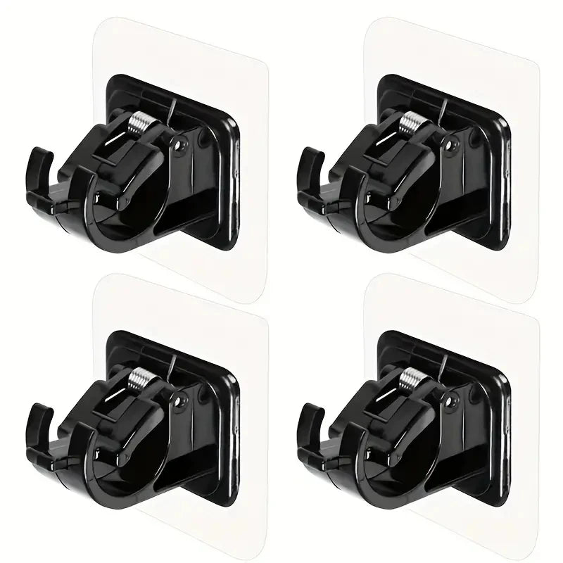 Four black adhesive curtain rod hooks or wall mount clips shown from different angles.