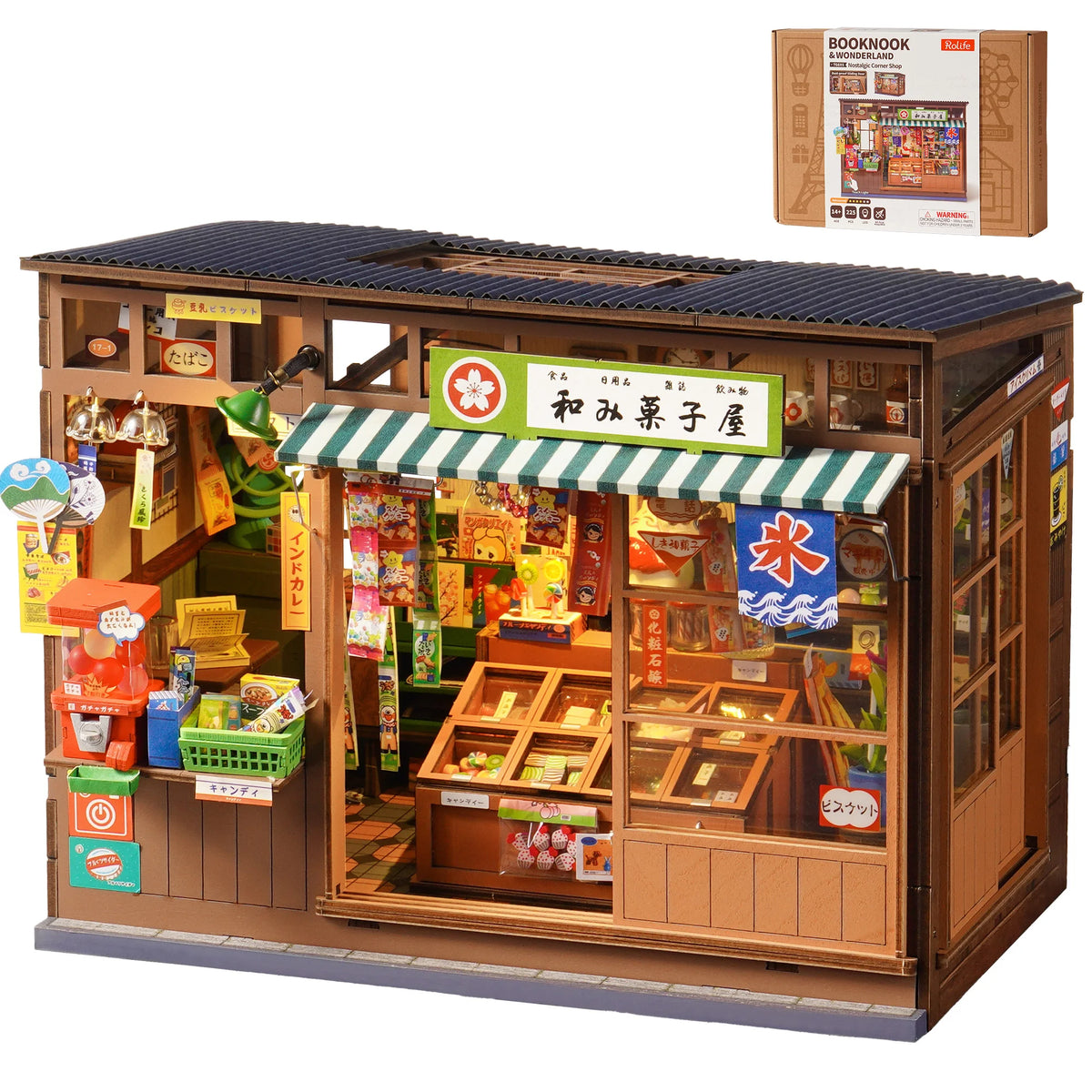 A wooden model kit of a vintage Japanese corner shop with an open display and a book nook insert.
