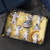 A collection of handcrafted astronaut figurine resin spacemen desk decor arranged in a box.