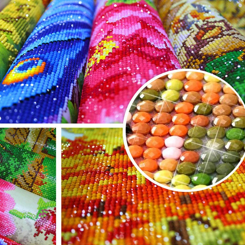 Close-up of colorful diamond painting fabric featuring vibrant reds, pinks, and greens with sparkling details.