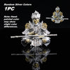 Hand-painted silver colored monkey king figurine with staff shown against a black background.