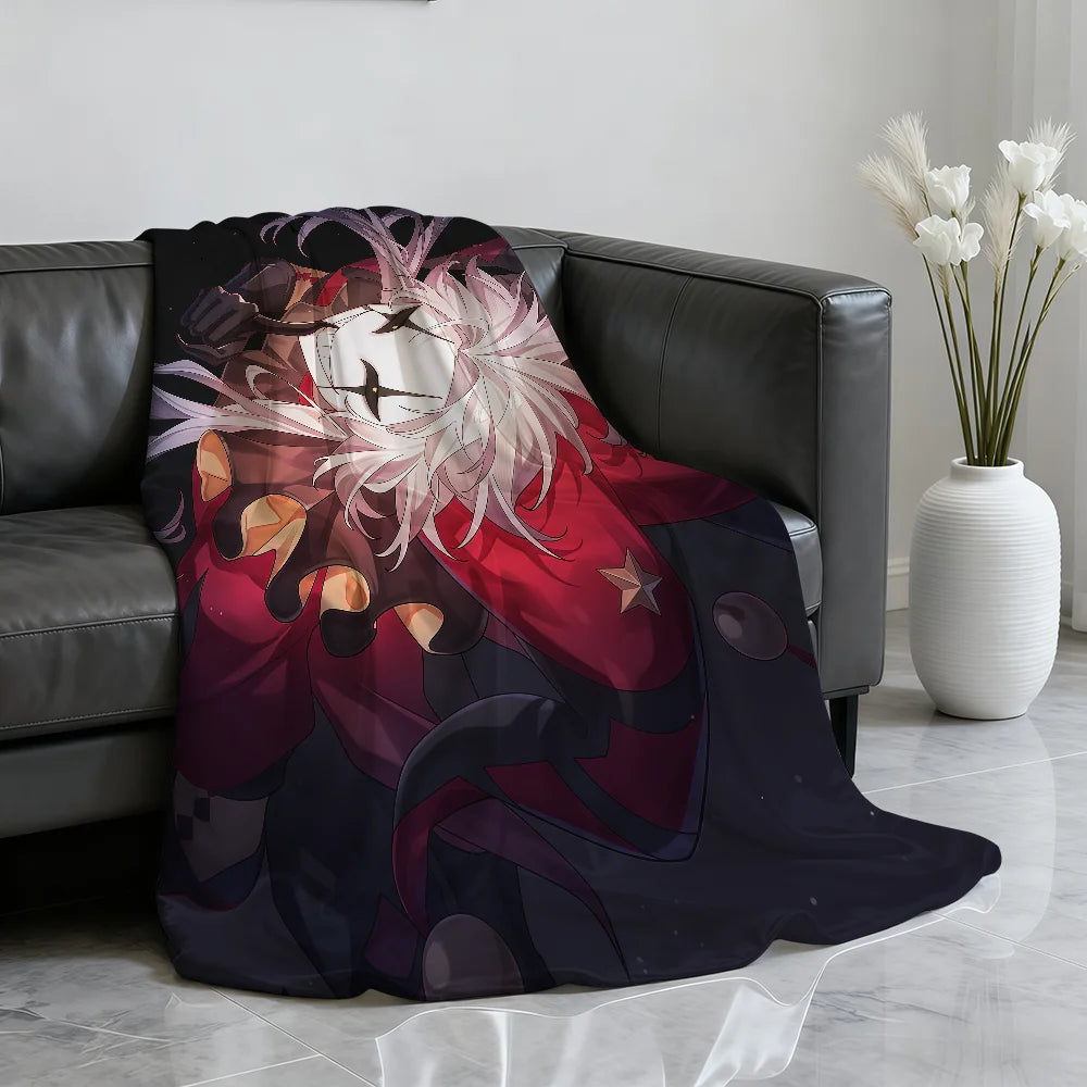 A dark purple and red throw blanket featuring a stylized, flamboyant circus character design.