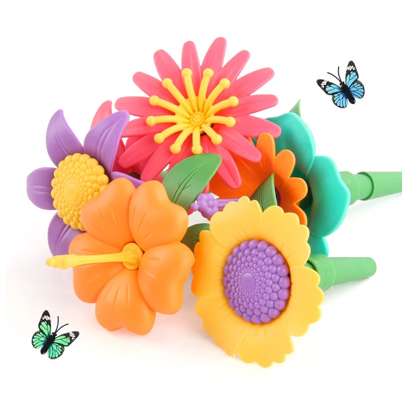 A collection of colorful plastic flowers and butterflies used in a STEM building toy set.