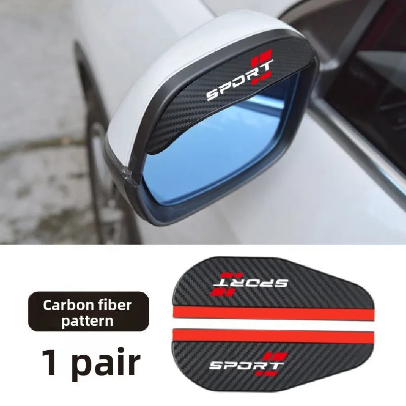 A pair of black carbon fiber rain covers designed for universal use on car side mirrors.
