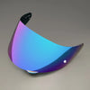 A replacement helmet visor with a gradient blue and purple anti-fog coating, shown from a side angle.