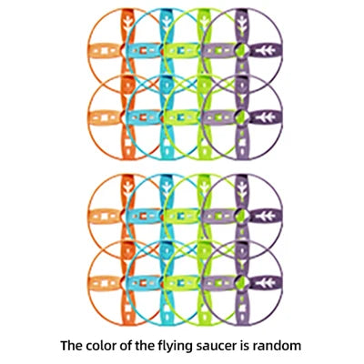 A grid of colorful pull-string flying saucers, showing various combinations of orange, blue, green, and purple.