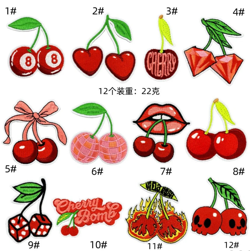 A collection of twelve embroidered iron-on patches featuring various fruit designs like cherries, apples, and berries.