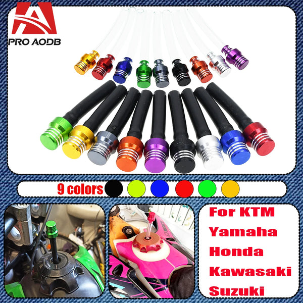 A set of nine colored motorcycle fuel tank breather valves for KTM, Yamaha, Honda, Kawasaki, and Suzuki.
