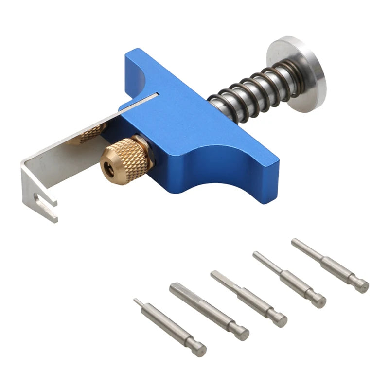 A blue tool for removing tiny whoop propellers, featuring a metal lever and an ejector pin kit.