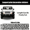 Leopard print decorative stickers shown on a white Jeep front grille and a rectangular strip.